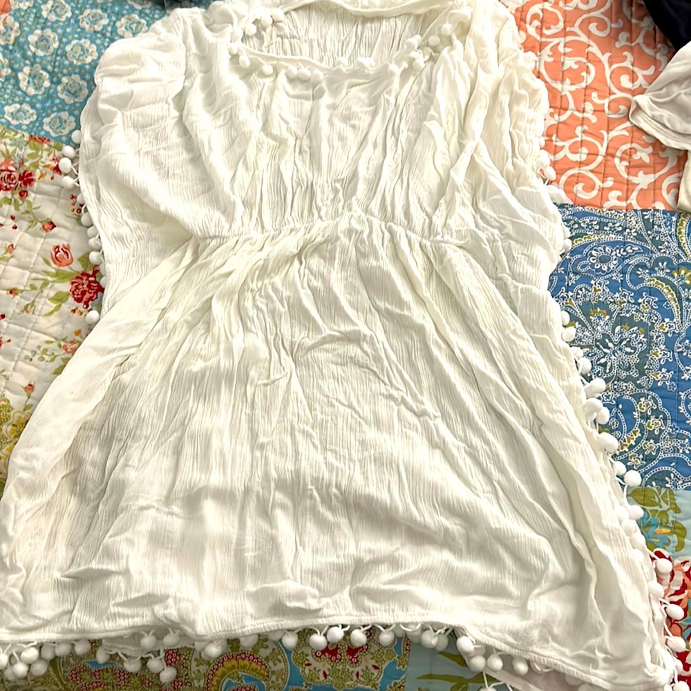White bathing suit cover